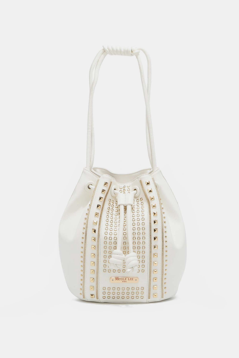 Introducing the Nicole Lee USA Amy Studded Bucket Bag, exclusively from Marianela's Exclusive Shop, LLC. This chic white bucket bag is made from pebbled vegan leather and is adorned with gold-tone stud detailing arranged in vertical lines on the front. It features a secure drawstring closure with knotted ends, a matching shoulder strap, and a subtle designer logo near the bottom.