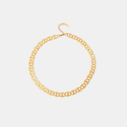 The Luxe Gold Chain Necklace by Marianela's Exclusive Shop features interlocking oval links and an adjustable clasp, crafted from 18K gold-plated material on a crisp white background, making it a sophisticated and stunning piece of jewelry.