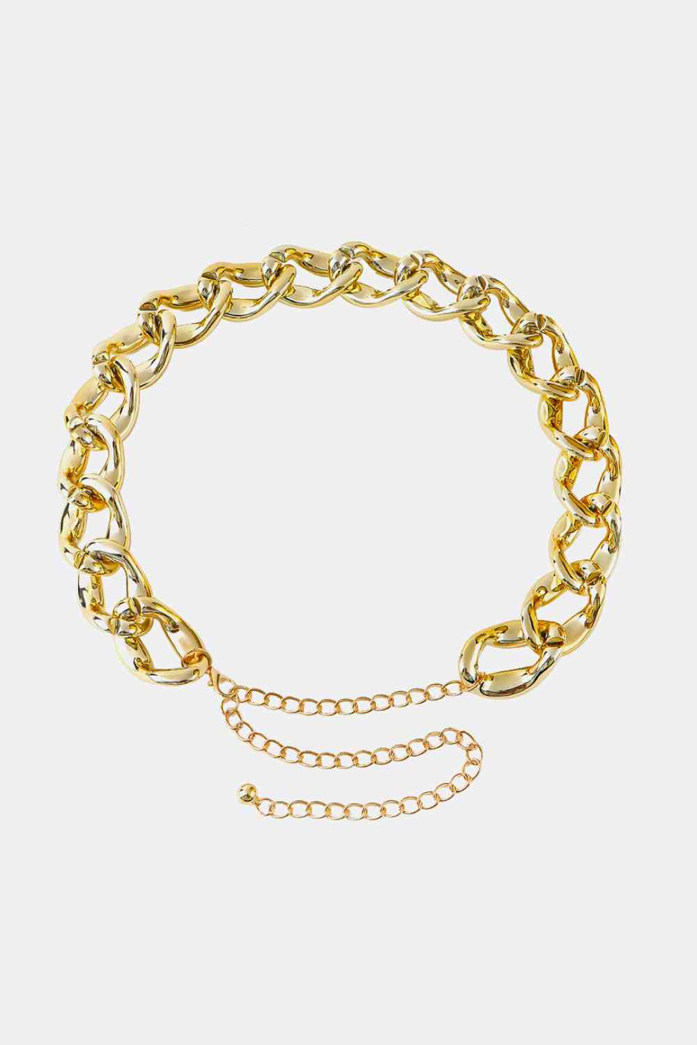 A shiny gold chain belt with large, interlocking links. It features an adjustable clasp with an extender chain and a small dangling charm at the end. This trendy fashion accessory, displayed on a plain white background, boasts bold acrylic links for a modern twist. The Acrylic Curb Chain Belt from Marianela's Exclusive Shop, LLC is perfect for adding a touch of elegance to any outfit.