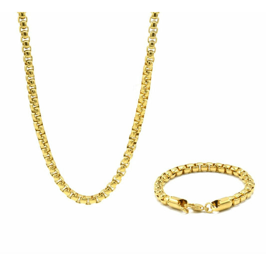 Image shows the Box Style Chain and Bracelet Set from Marianela's Exclusive Shop, LLC. Both pieces feature a chunky, interlocking stainless steel chain design with a high polish finish. The necklace is long and drapes downward, while the bracelet is coiled into a circular shape with a clasp.
